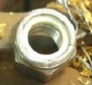 Tuerca inox nylon 3/8-16